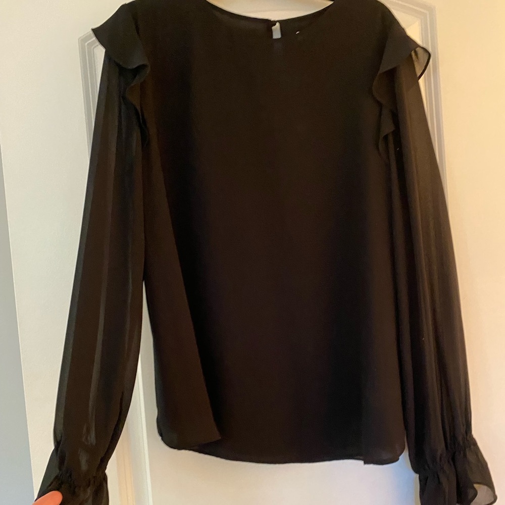 Black blouse.